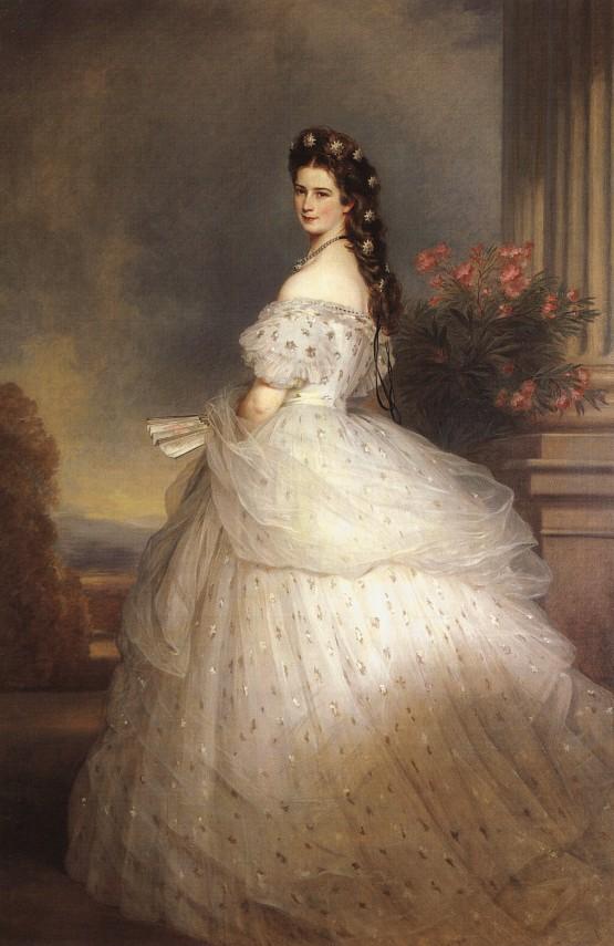 <em>Empress Elisabeth of Austria in Courtly Gala Dress with Diamond Stars,</em> olio su tela datato 1865, autore Franz-Xavier Winterhalter (1805 – 1873). <strong>E volete sapere di chi è l’abito? Di Charles F. Worth!</strong> (Dalla collezione della ex residenza imperiale <a href="https://www.hofburg-wien.at/en/" target="_blank" rel="noopener noreferrer">Hofburg</a> a Vienna – Source <a href="https://commons.wikimedia.org/wiki/File:Empress_Elisabeth_of_Austria_with_diamond_stars_on_her_hair.jpg" target="_blank" rel="noopener noreferrer">Wikimedia Commons</a> – file in the public domain including<a href="https://commons.wikimedia.org/wiki/Commons:Copyright_tags#United_States" target="_blank" rel="noopener noreferrer"> the US</a>)